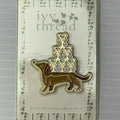 Weenie with a Tinis Needle minder